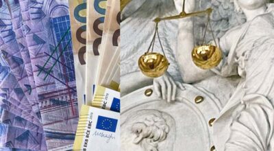 Euro-Geldscheine und Justitia Statue